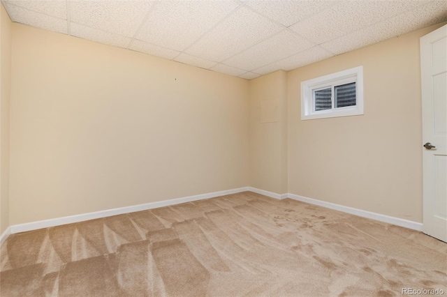 8182 Sweet Water Rd, Lone Tree, CO 80124 - spare room featuring light colored carpet, a paneled ceiling, and baseboards