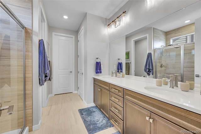 bathroom with vanity and walk in shower