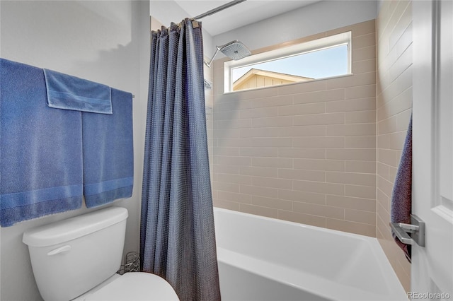 bathroom featuring toilet and shower / bath combo with shower curtain