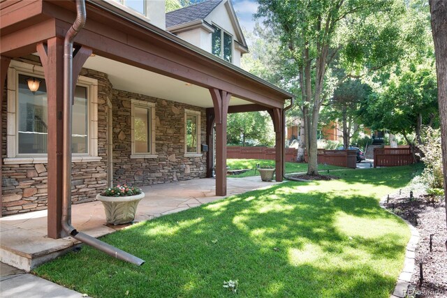 view of yard with a patio area