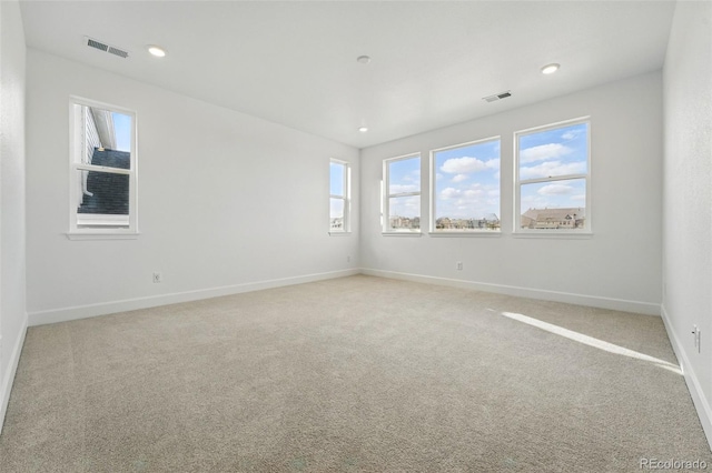 16537 Black Rose Cir, Parker, CO 80134 - empty room with baseboards, visible vents, recessed lighting, and light carpet