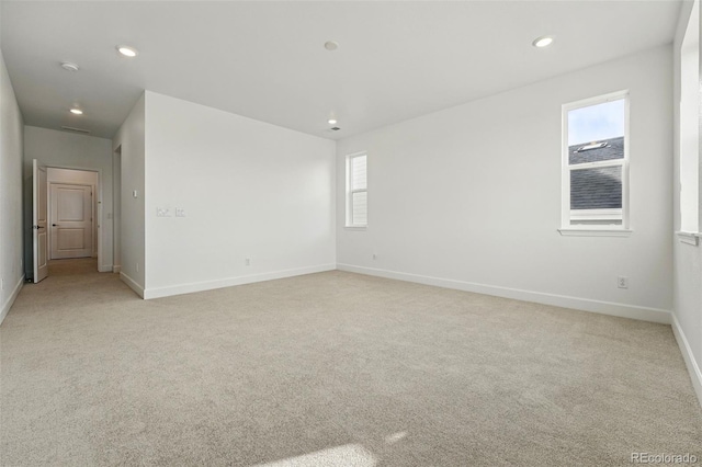 16537 Black Rose Cir, Parker, CO 80134 - spare room with baseboards, recessed lighting, and light colored carpet