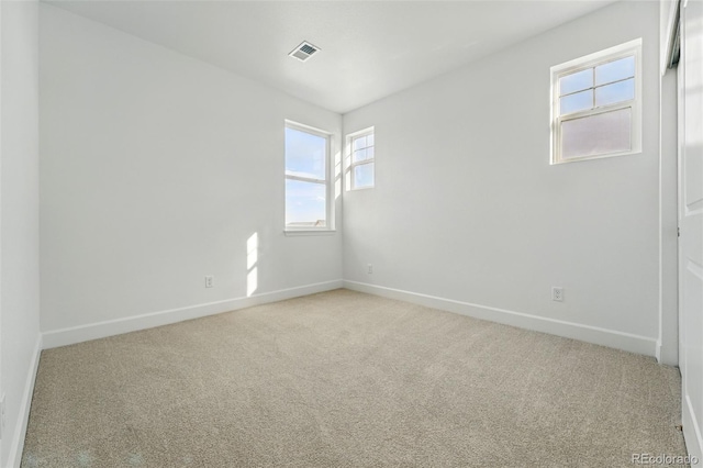 16537 Black Rose Cir, Parker, CO 80134 - unfurnished room with baseboards, light colored carpet, and visible vents