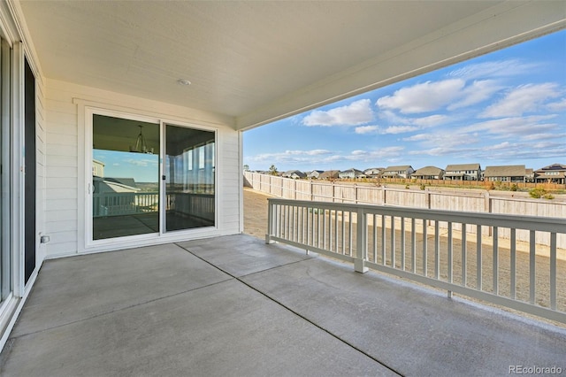 16537 Black Rose Cir, Parker, CO 80134 - view of patio / terrace with a residential view and fence