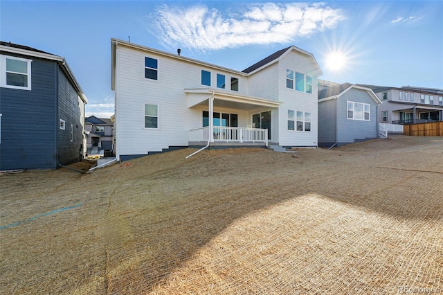 16537 Black Rose Cir, Parker, CO 80134 - rear view of property with a porch