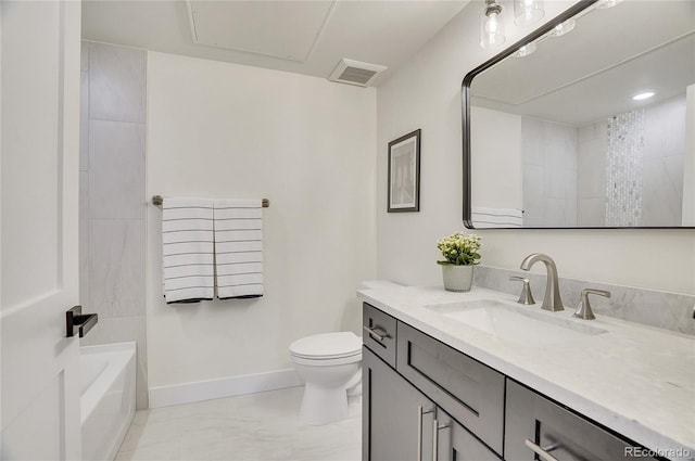 bathroom featuring tile flooring, toilet, and vanity