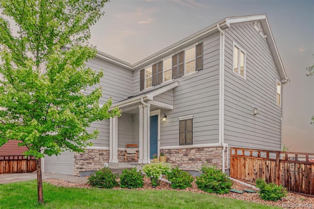 3168 Raintree Ln, Dacono, CO 80514 - view of front of home with a garage and stone siding