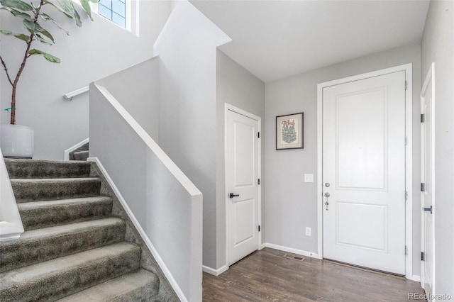 3168 Raintree Ln, Dacono, CO 80514 - foyer featuring wood finished floors and stairs