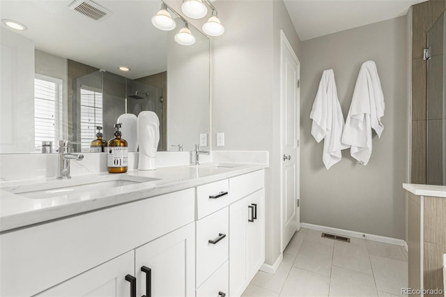 3168 Raintree Ln, Dacono, CO 80514 - full bath with double vanity, a shower with door, tile patterned flooring, and recessed lighting