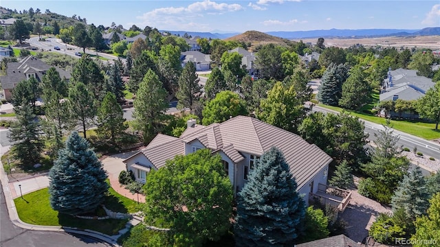 drone / aerial view featuring a mountain view