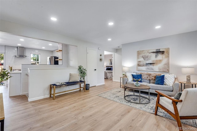 living room with light hardwood / wood-style floors