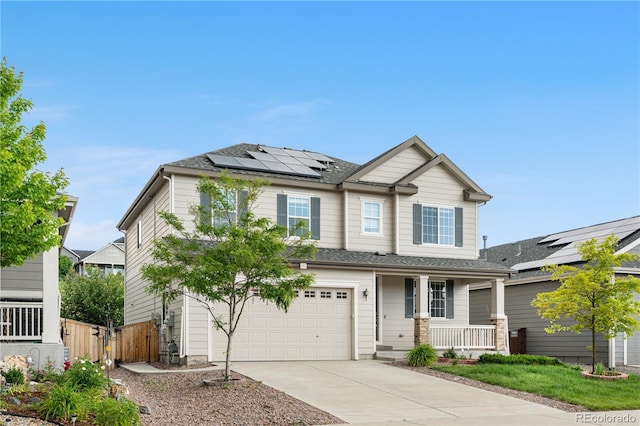 6387 Agave Ave, Castle Rock, CO 80108 - view of front facade with covered porch, driveway, roof mounted solar panels, and a garage