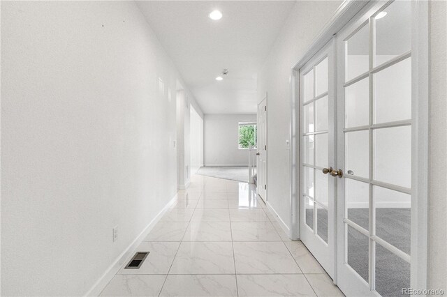 6387 Agave Ave, Castle Rock, CO 80108 - hall with recessed lighting, light marble finish flooring, and french doors