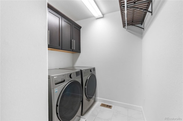 6387 Agave Ave, Castle Rock, CO 80108 - laundry area with cabinet space and washing machine and dryer