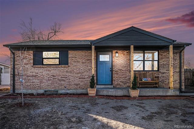 view of front of property featuring covered porch