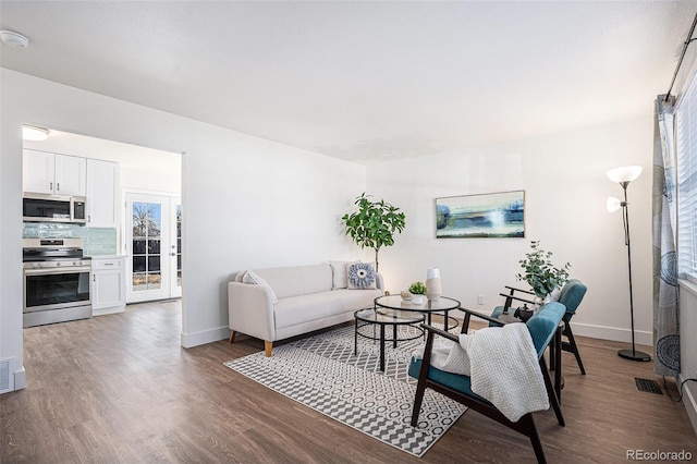 living room featuring dark hardwood / wood-style floors