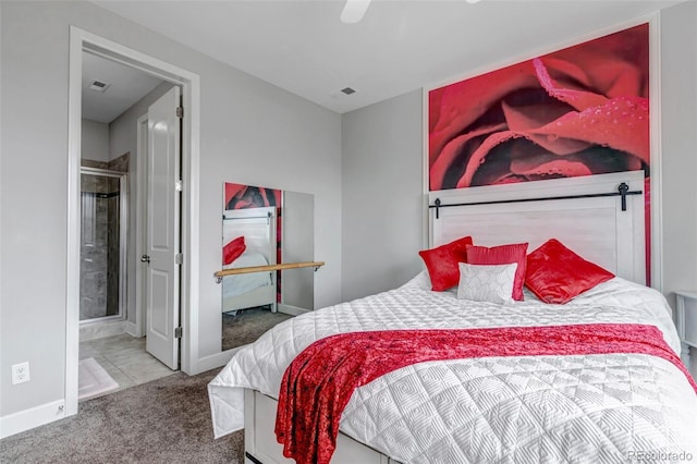 carpeted bedroom with visible vents, a ceiling fan, baseboards, and connected bathroom