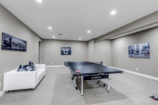 recreation room with recessed lighting, baseboards, and light carpet