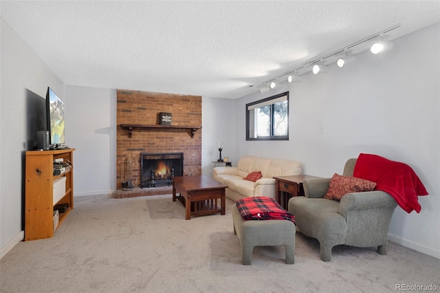 living area with a brick fireplace, a textured ceiling, and light colored carpet