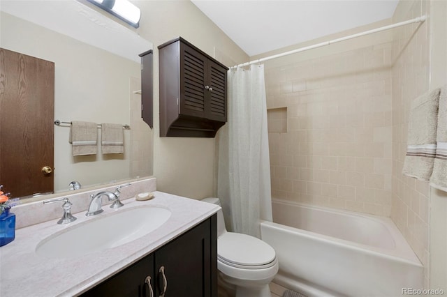 bathroom with toilet, shower / tub combo with curtain, and vanity