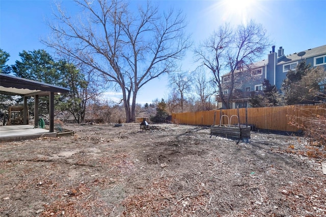 view of yard featuring fence