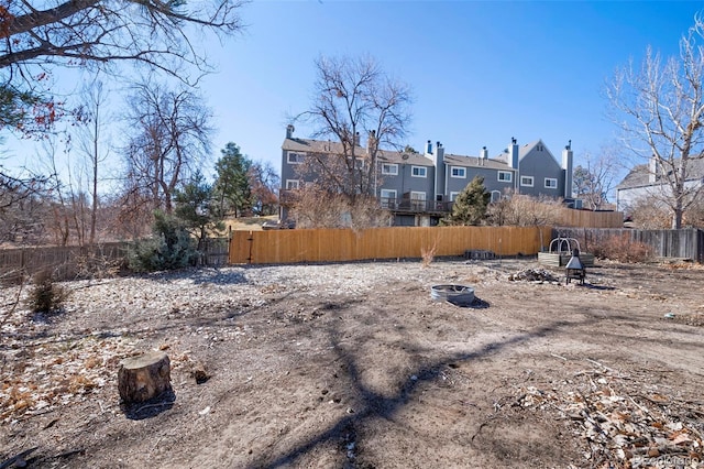 view of yard featuring a residential view and fence