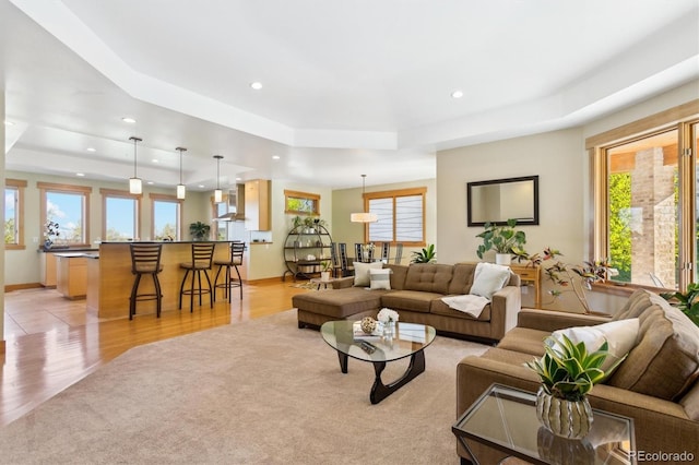 4305 Easley Rd, Golden, CO 80403 - living room featuring a raised ceiling, plenty of natural light, and recessed lighting