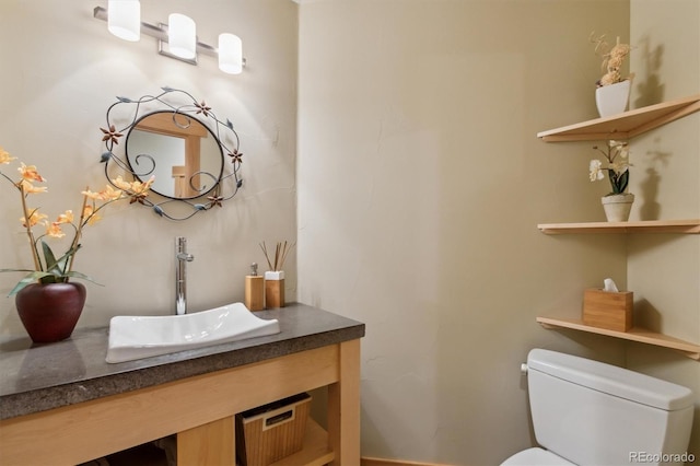 4305 Easley Rd, Golden, CO 80403 - half bathroom with vanity and toilet