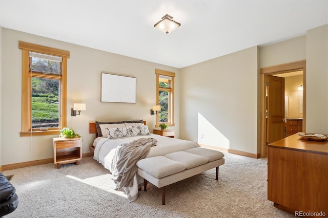 4305 Easley Rd, Golden, CO 80403 - bedroom with baseboards, multiple windows, and light colored carpet