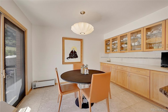 dining area with light tile patterned flooring