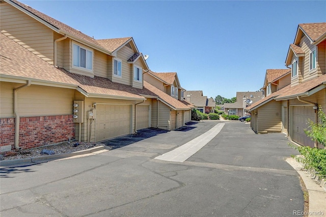 2181 S Troy Way Unit 103, Aurora, CO 80014 - view of asphalt road with a residential view