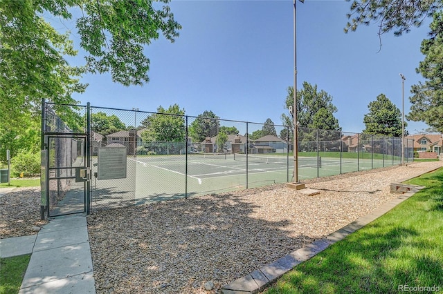 2181 S Troy Way Unit 103, Aurora, CO 80014 - view of tennis court featuring a gate