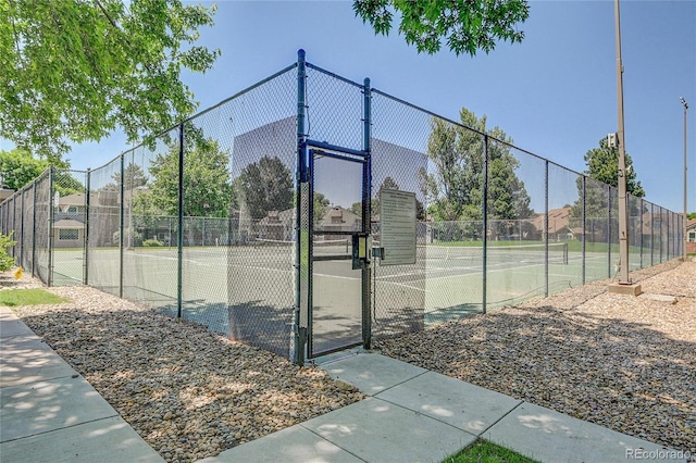 2181 S Troy Way Unit 103, Aurora, CO 80014 - view of tennis court with a gate