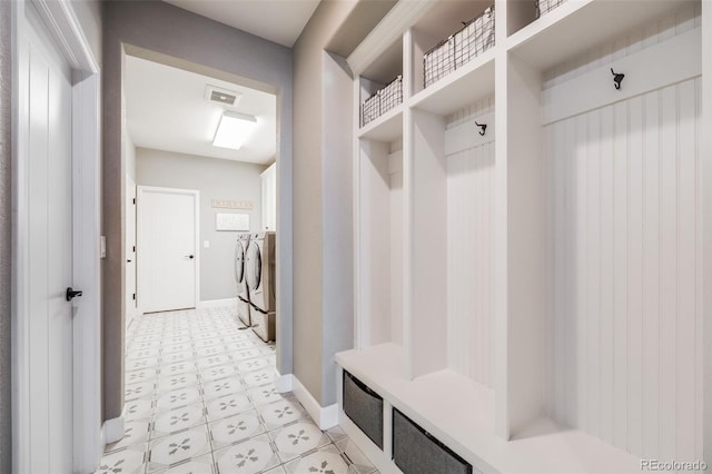 8750 Red Primrose St, Franktown, CO 80116 - mudroom with independent washer and dryer, baseboards, visible vents, and light floors