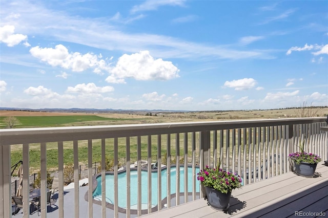 8750 Red Primrose St, Franktown, CO 80116 - wooden terrace with an outdoor pool