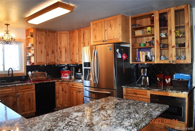 kitchen with a sink, stainless steel fridge with ice dispenser, dishwasher, open shelves, and dark stone countertops