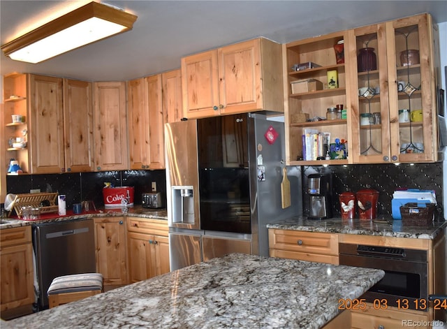 kitchen with open shelves, backsplash, and appliances with stainless steel finishes