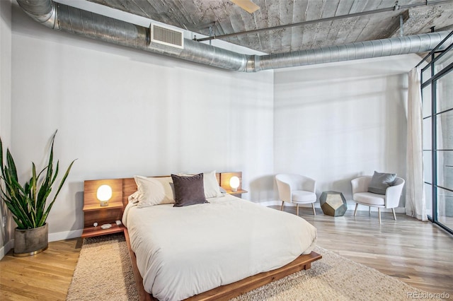 bedroom with light wood-type flooring