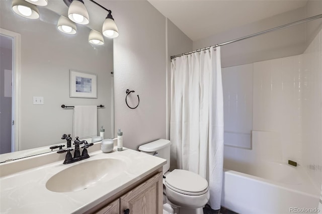 bathroom with toilet, vanity, and shower / tub combo with curtain