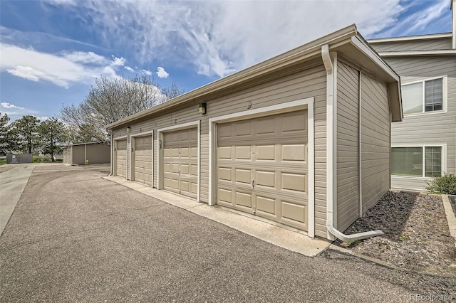 garage with driveway