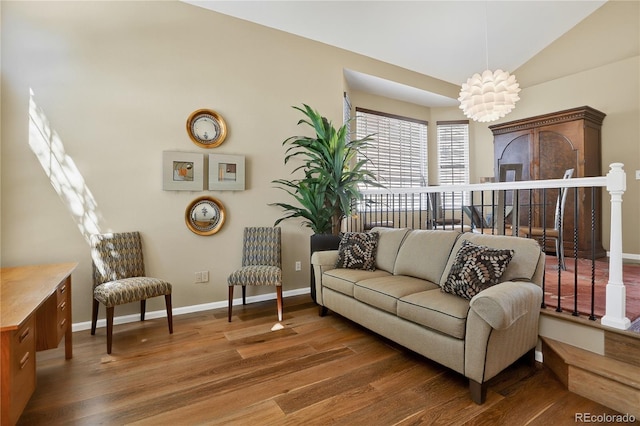 18153 E Amherst Dr, Aurora, CO 80013 - living area featuring wood finished floors and lofted ceiling