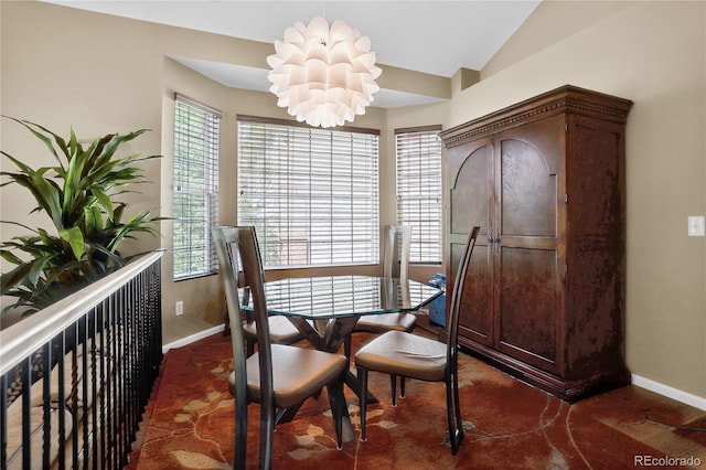 18153 E Amherst Dr, Aurora, CO 80013 - dining area with a chandelier, plenty of natural light, and vaulted ceiling