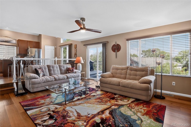 18153 E Amherst Dr, Aurora, CO 80013 - living area with ceiling fan and wood finished floors
