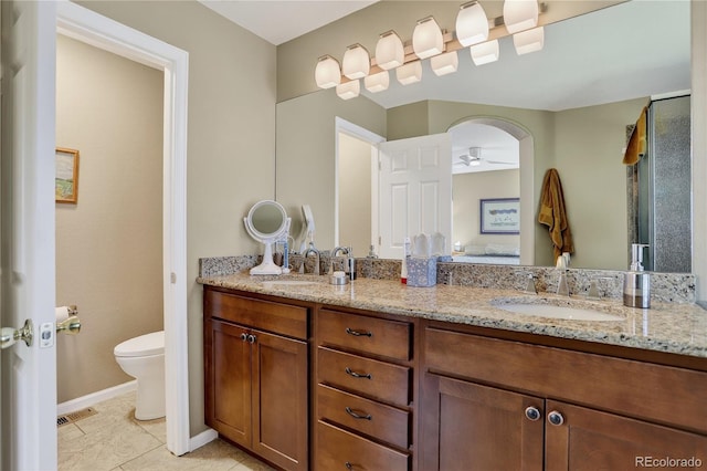 18153 E Amherst Dr, Aurora, CO 80013 - bathroom with double vanity, tile patterned floors, ensuite bathroom, and a shower with shower door