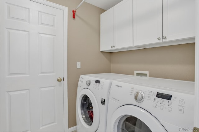 18153 E Amherst Dr, Aurora, CO 80013 - washroom with washer and clothes dryer and cabinet space