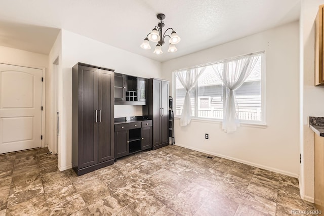 5770 Waverley Ave, Firestone, CO 80504 - kitchen featuring a chandelier and hanging light fixtures