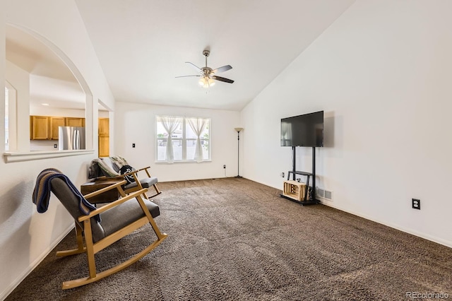 5770 Waverley Ave, Firestone, CO 80504 - living area with ceiling fan, carpet floors, arched walkways, and high vaulted ceiling
