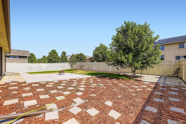 5770 Waverley Ave, Firestone, CO 80504 - fenced backyard with a patio area
