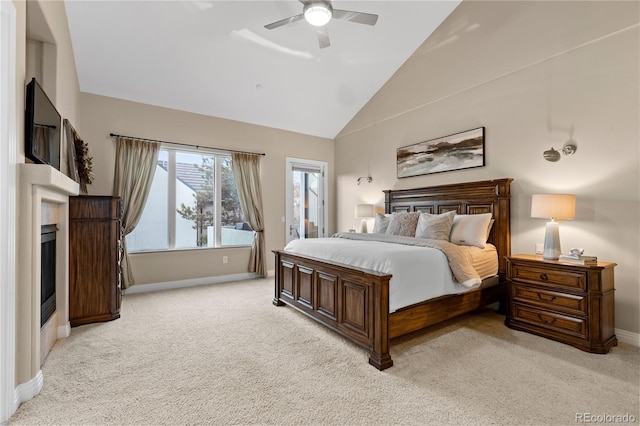 bedroom with access to exterior, high vaulted ceiling, light colored carpet, and ceiling fan