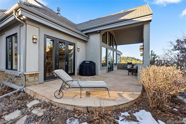 view of patio featuring a grill